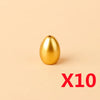 A single golden egg-shaped building block from a treasure chest set.