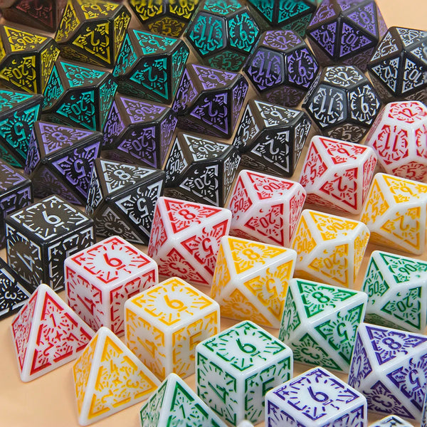 A collection of multi-sided polyhedral dice in various colors and patterns for tabletop gaming.