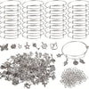 A collection of 90 pieces of silver-tone jewelry making components including bangles, charms, and findings.