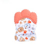 A pair of orange cartoon baby teething mittens with a white and orange pattern.