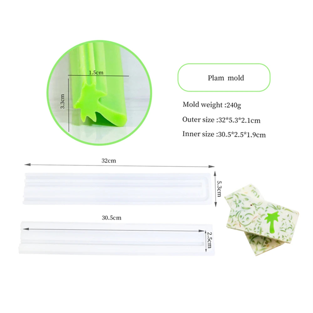 A set of silicone molds for soap and candles, including a green mold and various white and patterned shapes.