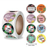 Roll of colorful round thank you stickers in various floral patterns for gifts and packaging