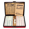 A classic Chinese Mahjong set with 144 tiles displayed inside a red carrying case and wooden box.