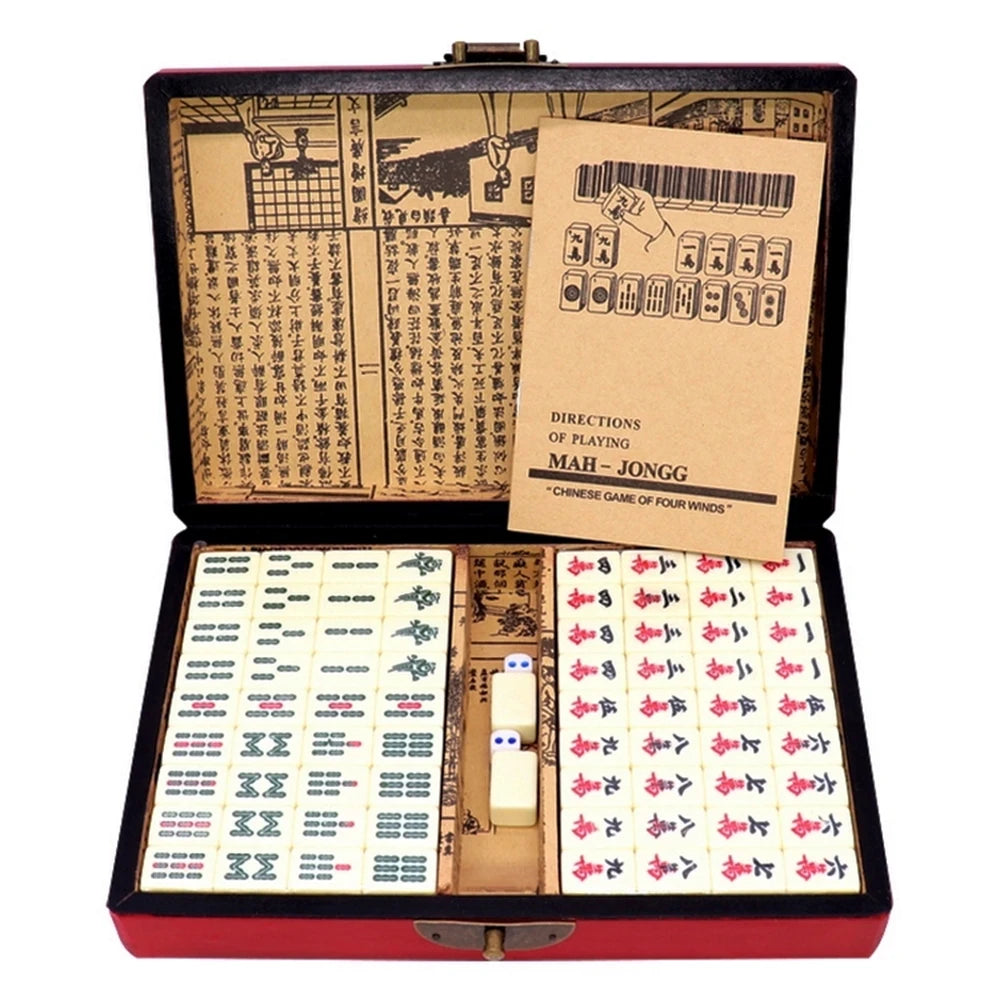 A classic Chinese Mahjong set with 144 tiles displayed inside a red carrying case and wooden box.