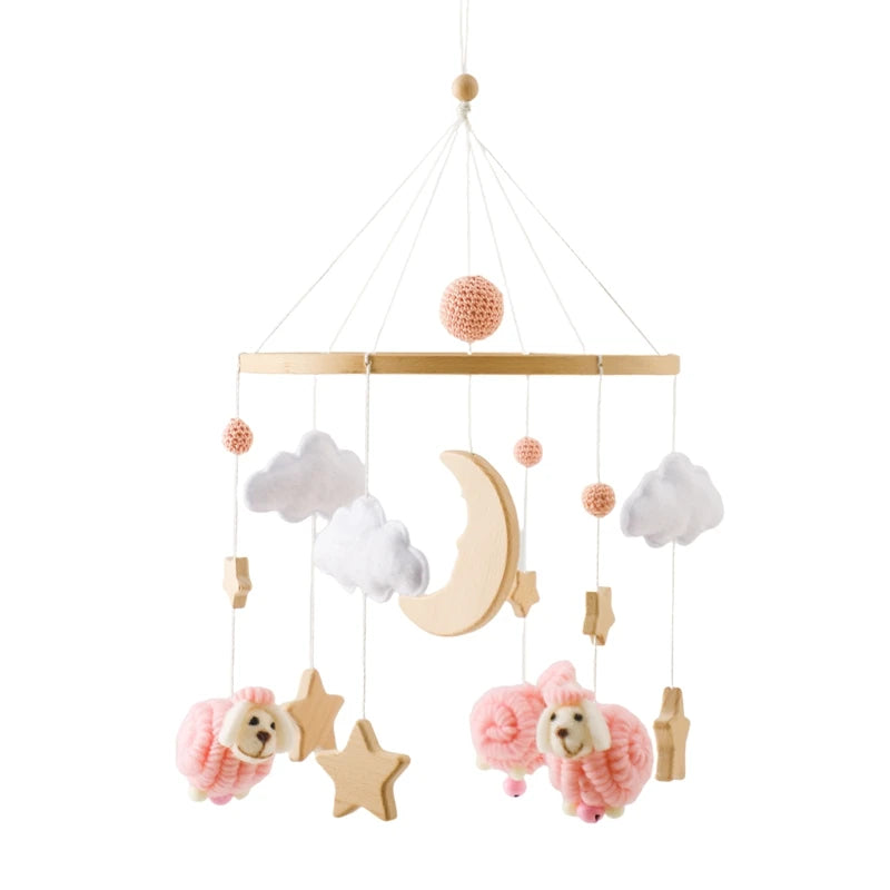 Wooden felt forest animal crib mobile featuring white clouds and a pink lion puppy.