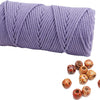 A skein of purple natural cotton macrame rope used for crafts and decor.