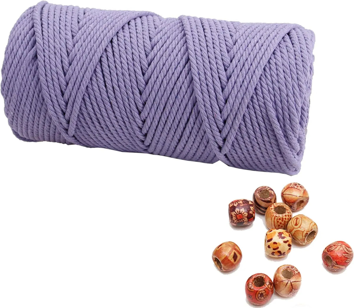 A skein of purple natural cotton macrame rope used for crafts and decor.