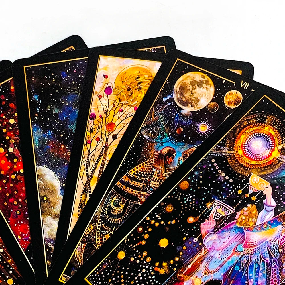 A close-up of a deck of illuminated tarot cards featuring cosmic and mystical imagery.