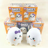 A collection of orange and white Ghost Squishy stress relief toys in their packaging and as squishy figures.