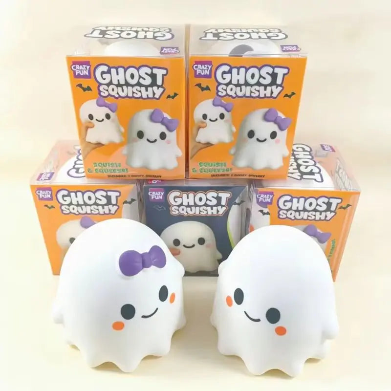 A collection of orange and white Ghost Squishy stress relief toys in their packaging and as squishy figures.