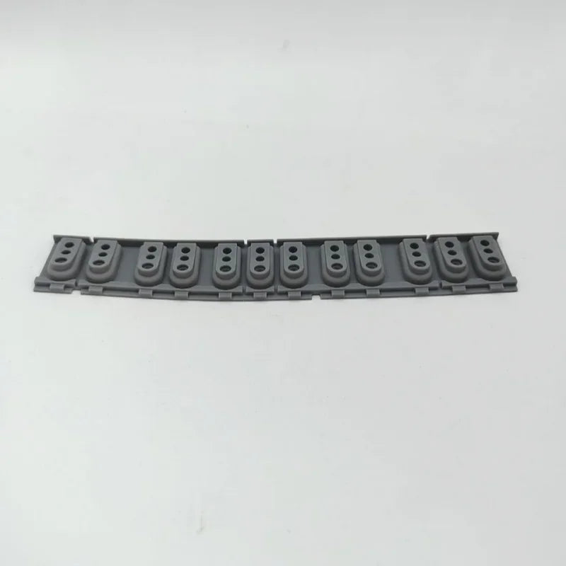A strip of replacement keyboard contact strips for a Yamaha digital piano, featuring multiple small, rectangular contacts.