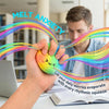 A hand squeezes a colorful, squishy dumpling toy to relieve anxiety, with rainbow-colored stress lines emanating from it.