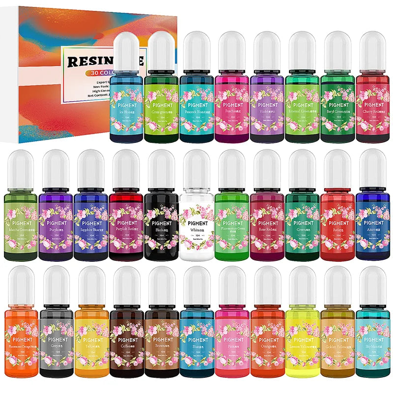 A collection of vibrant candle dye pigments in various colors packaged in glass bottles.