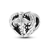 A sterling silver charm bead featuring a winged design and a central gemstone setting.