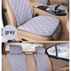 Gray universal car seat protector with quilted fabric and anti-slip backing shown in a vehicle interior.