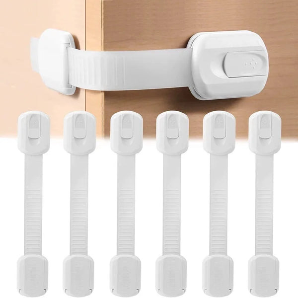 White cabinet and drawer safety locks shown in various forms, including a long latch and individual locks.