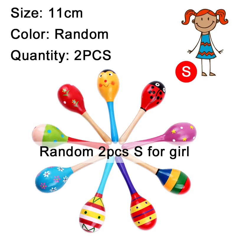 Two random wooden sand hammers for girls, one yellow and one pink.