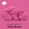 A ball of pink Merino wool yarn labeled as Lirisnly's hand-picked 300g Merino.