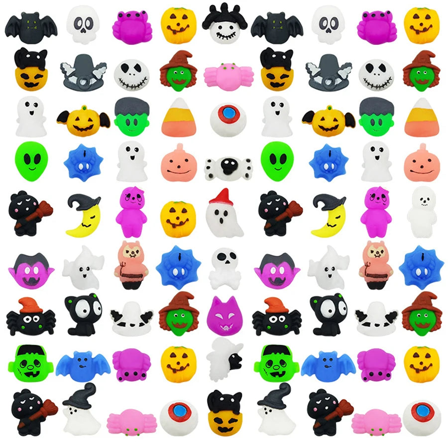 A collection of squishy stress relief toys shaped like a ghost, cat, and pumpkin mochi.