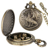 A brass steampunk dragon pocket watch dice case with a hinged lid and attached chain.