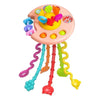 A pink baby pull-string sensory toy with silicone teether featuring colorful fruit shapes.