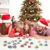 A family is playing with a 5-pack of mini pull-back race cars on a white surface in front of a Christmas tree.