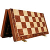 A handcrafted wooden folding chessboard with a walnut checkered board and solid pieces.
