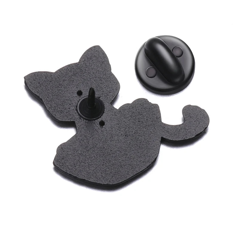 Set of four black cat enamel pins with a round pin and a silhouette design.