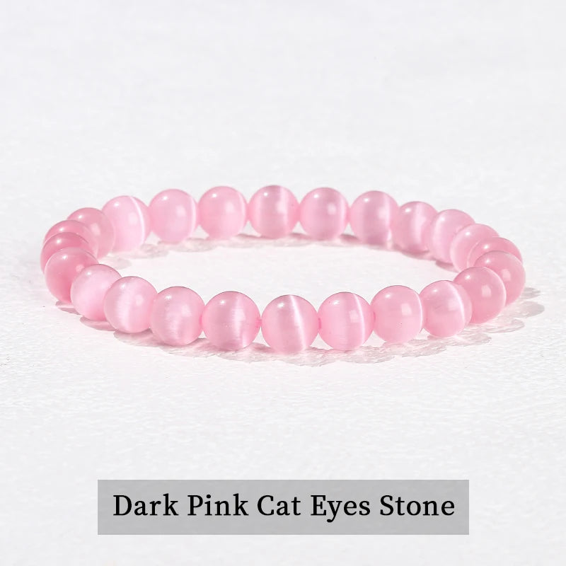 A bracelet made of natural pink quartz beads in a stretch style, arranged in a circle.
