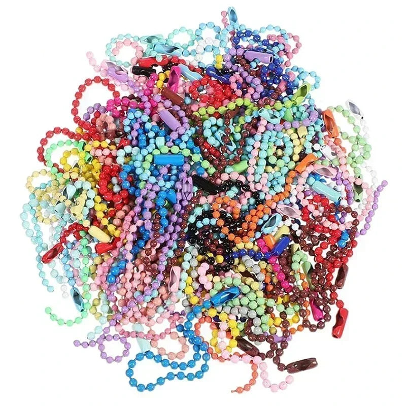 A colorful pile of ball bead chains in various bright colors like pink, blue, green, and red.