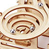 A wooden spiral marble run puzzle kit featuring wooden tracks and silver marble balls.