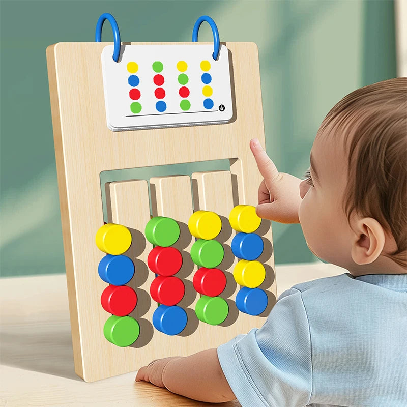 A baby is interacting with a wooden color and shape matching game board featuring colored buttons.