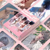 A box of Love and Deepspace photo cards featuring male models in various poses and outfits.