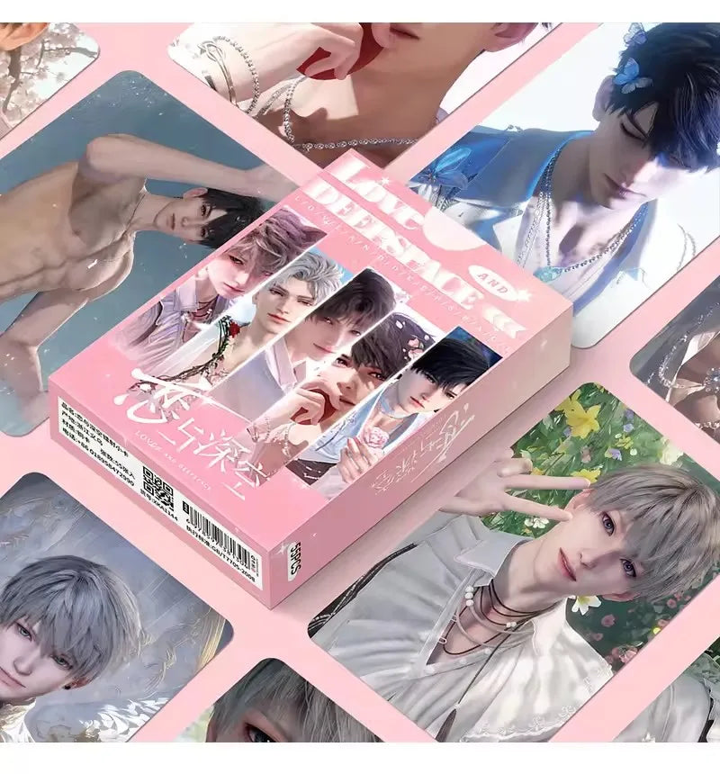 A box of Love and Deepspace photo cards featuring male models in various poses and outfits.
