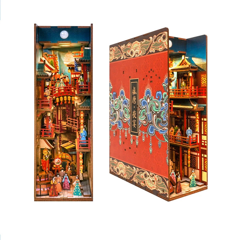 A DIY book nook kit featuring a detailed miniature Japanese-style building with LED lighting and a dust cover.