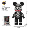 A black bear micro building block kit featuring a detailed face and body, shown with packaging.