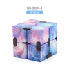 A cube-shaped fidget toy with a marbled purple and blue design.