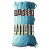A set of six skeins of vibrant embroidery thread in various shades of teal and blue for cross stitch and DIY crafts