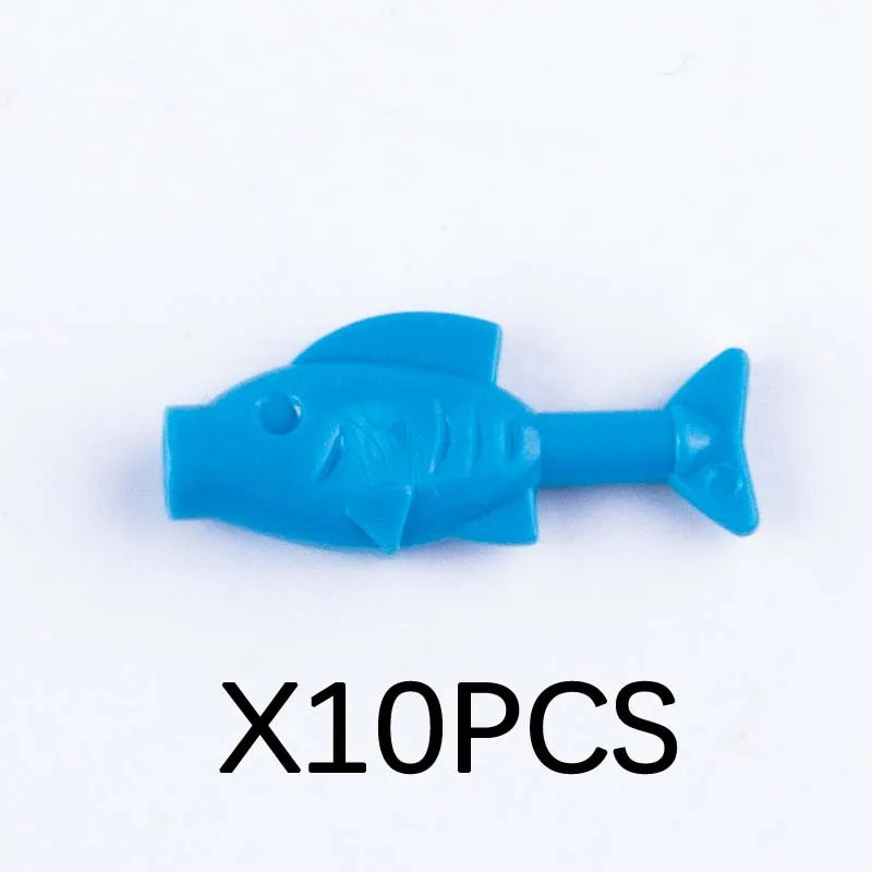 A bright blue plastic shark marine animal building block.