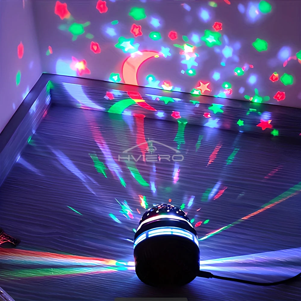 A starry night light projector casts colorful, rotating celestial scenes onto a surface.