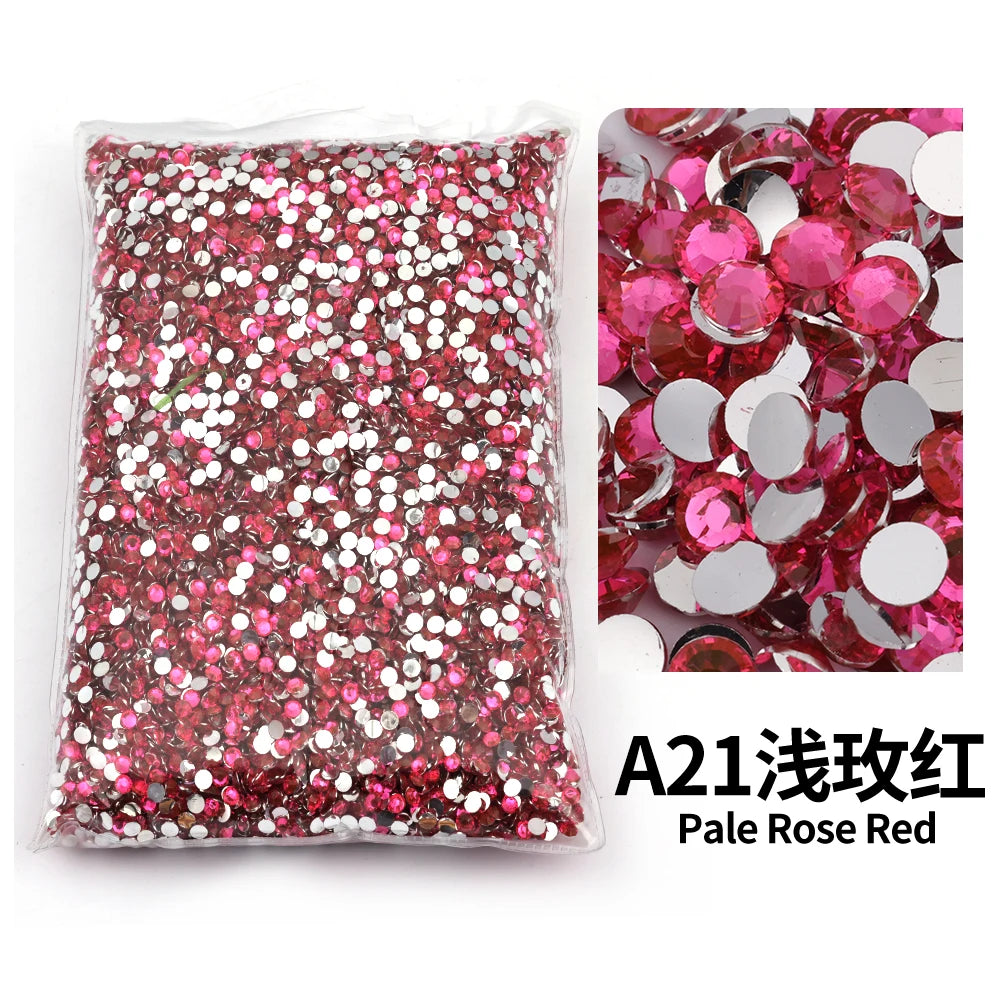 Bag of pink glitter rhinestones in a flat-back resin for craft and nail art