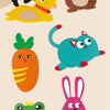 A collection of felt animals including a bear, a dog, a carrot, a cat, and a rabbit.
