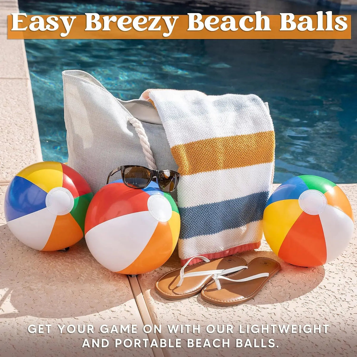A set of colorful inflatable beach balls, including orange, yellow, and blue, are displayed next to a towel and sandals by a 