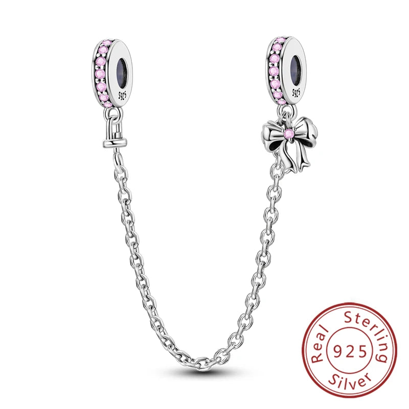 Sterling silver heart charm beads for bracelets featuring pink stones and a bow detail