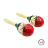 A pair of hand-painted wooden maracas with natural wood handles and red bodies.