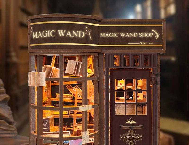 A wooden miniature kit of a magic wand shop display featuring various items and a sign.