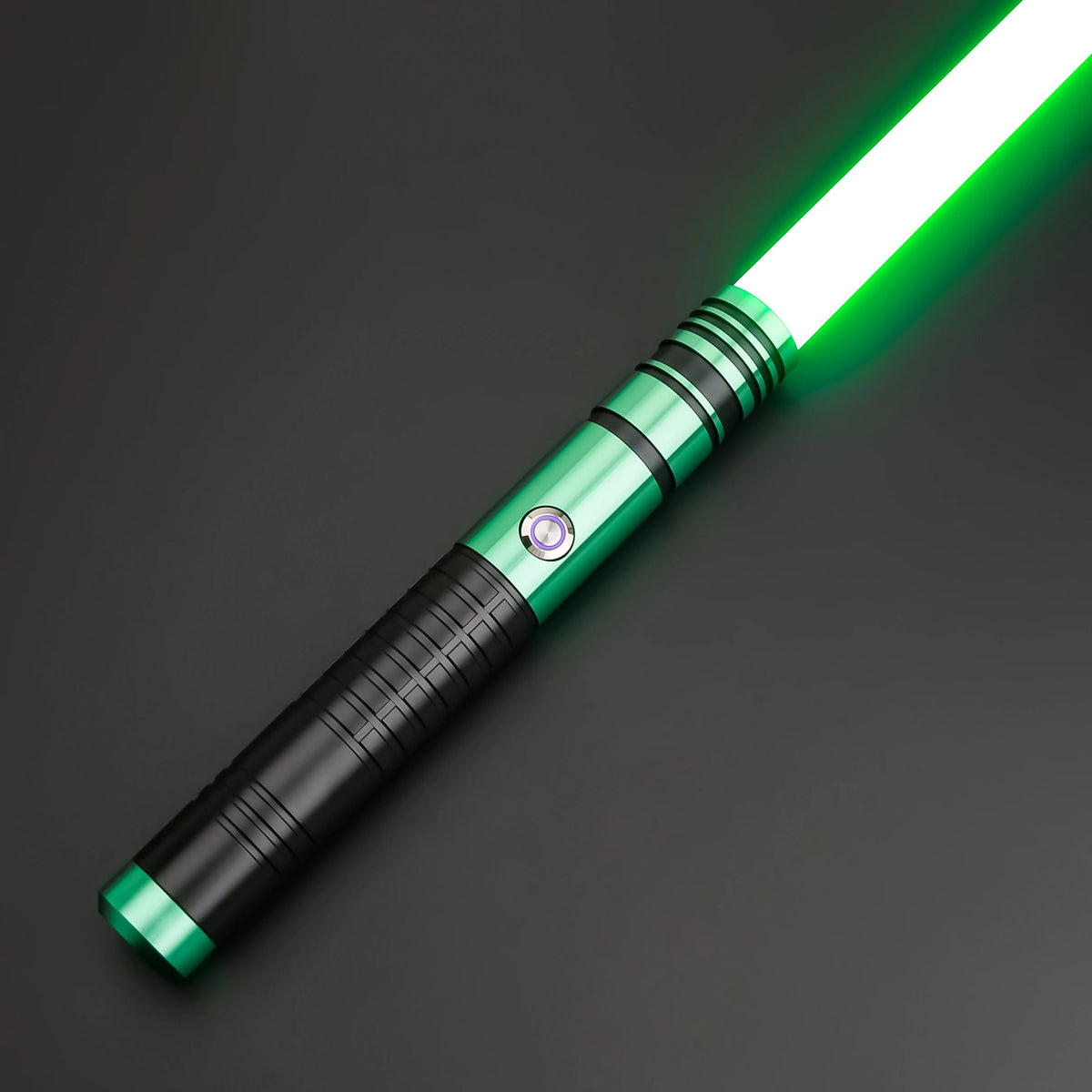 A green lightsaber toy with a metal handle and rechargeable battery, shown diagonally against a dark background.