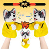 A set of three yellow husky puppets with white fur and black markings facing each other in a boxing pose.