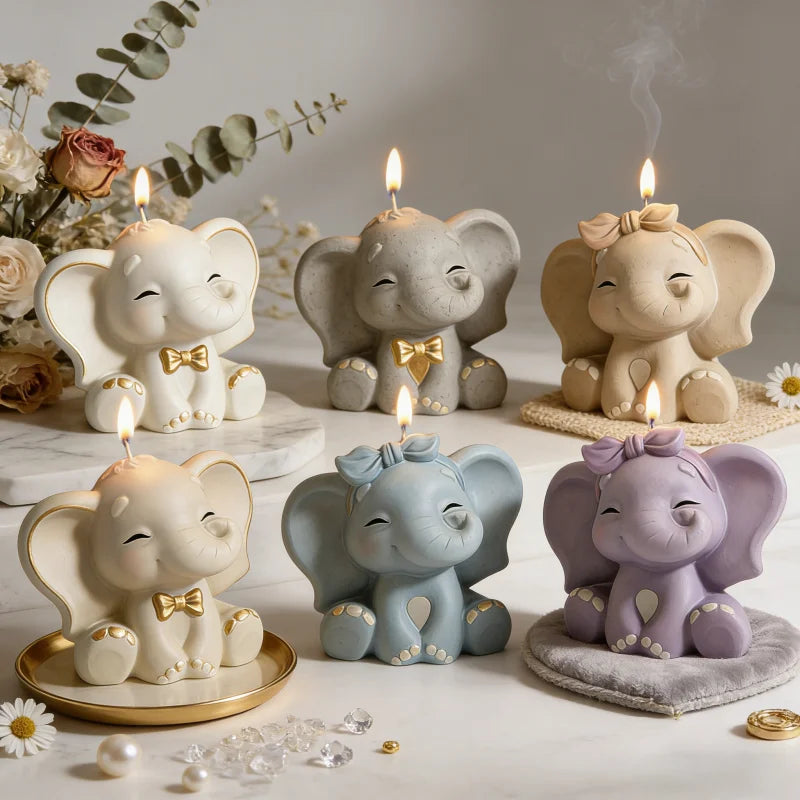 A collection of three elephant silicone molds in white, blue, and purple used for candle soap and resin crafts.