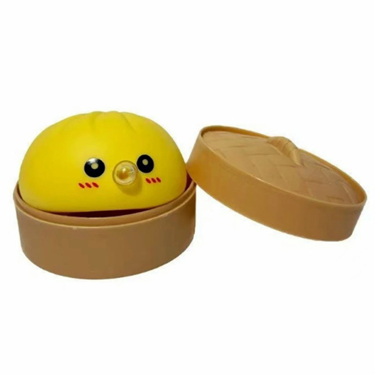 A yellow, round squishy toy shaped like a dumpling with a lid resting beside it.
